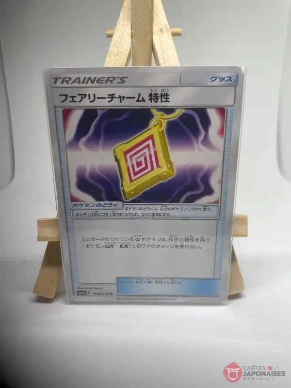 Japanese Trainer card Pokémon Tool Fairy Charm Ability 048/055, sm9a Night Unison set (Unbroken Bonds), illustrated by Toyste Beach