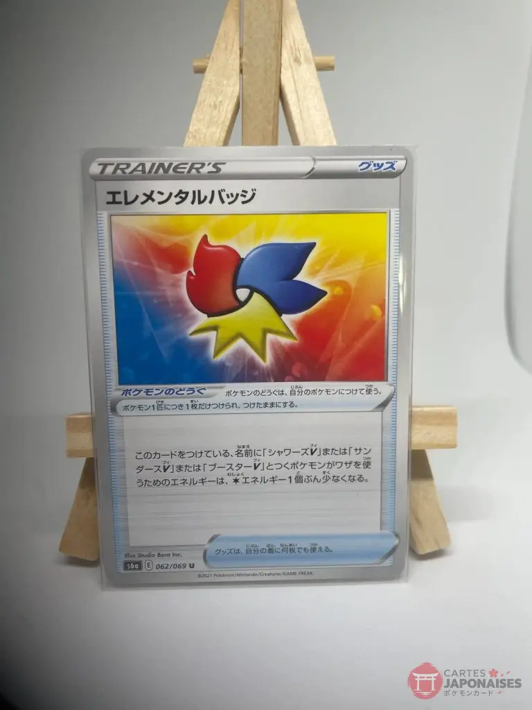 Japanese Trainer Pokémon Tool card Elemental Badge 062/069, set s6a Eevee Heroes Evolving Skies, illustrated by Studio Bora Inc.