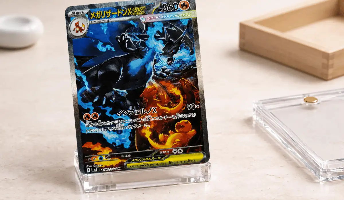 Japanese Pokémon card Mega Charizard X ex SAR 110/080 from the MEGA Inferno X (m2) set, displayed on an acrylic stand