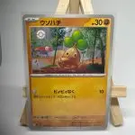 Japanese Pokémon card Bonsly 058/108, set sv3 Ruler of the Black Flame Obsidian Flames, illustrated by Mizue