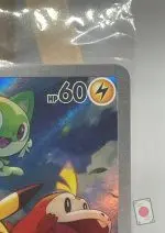 Close-up of the top right corner of the Pikachu promo 001/SV-P card — 60 HP